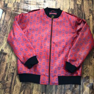 All-over monogram print Red Leather Jacket with blue patterns, black ribbed collar, and shoulder epaulets.