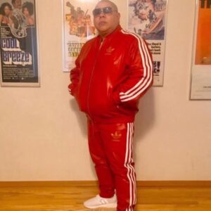 Red Customized Leather Jacket with white sleeve stripes and matching leather pants, full zip front, athletic fit street style look.